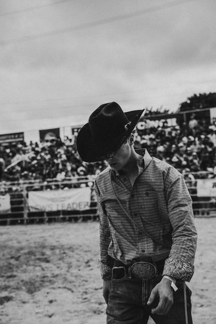 services-01 Captivating portrait of a cowboy at a lively rodeo event in Miami, FL.